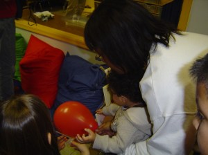 Alexander and mommy having fun at a ROCKETS classroom event.